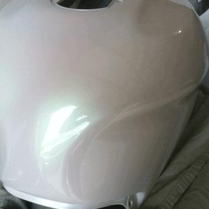 Green Shimmer Ghost Pearl kustom Painted Motorcycle tank.