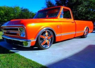 Blue Ghost Pearl on this orange Chevy Truck.