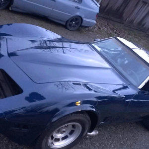 Electric Blue Corvette painted over black base coat. True kustom Paint.