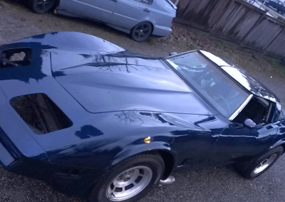 Electric Blue Corvette painted over black base coat. True kustom Paint.