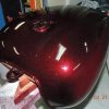 Fire Red Motorcycle tank sprayed with our .004" Fire Red Flake.