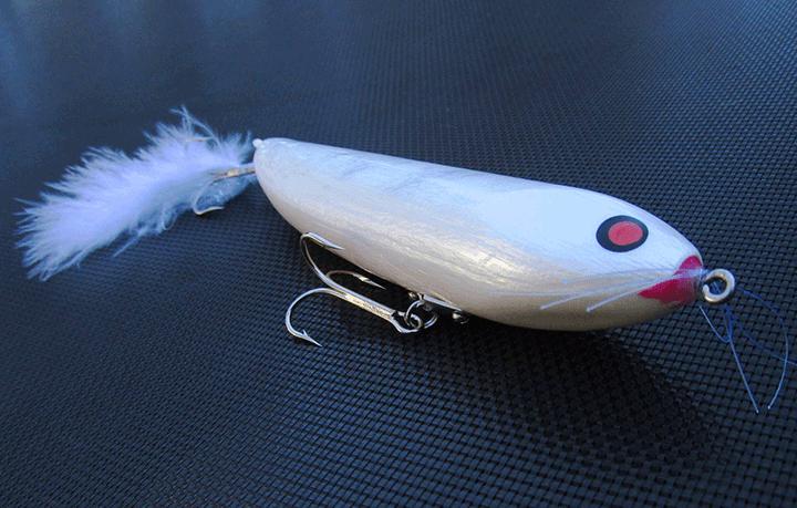 This kustom fishing lure has a silver ghost pearl in the sub-coat.