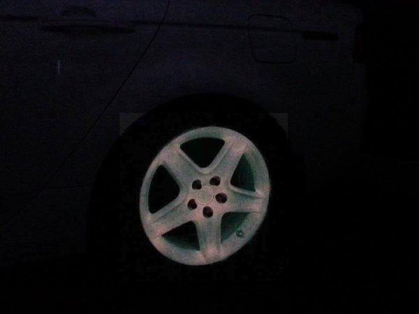 Glow in the Dark Wheel painted with our Pink to Orange Glow in the Dark kustom paint Pigment.