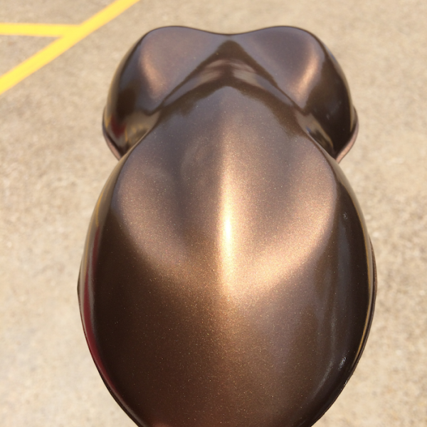 Nut Brown kandy paint pearls sprayed on a speed shape, or car shape test panel.