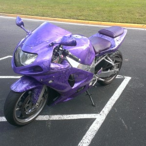 Purple kandy pearl over black marble with silver metal flake